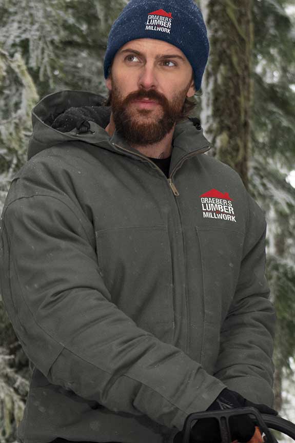 man wearing jacket with embroidered logo